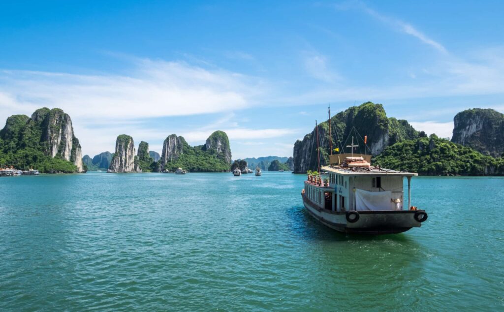 Tourist,Ferry,Boat,In,Halong,Bay,,The,Unesco,World,Heritage