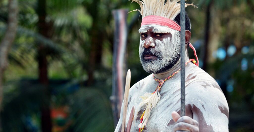 Portrait,Of,One,Aboriginal,Australian,Adult,Male,Warrior,,Holding,Aboriginal