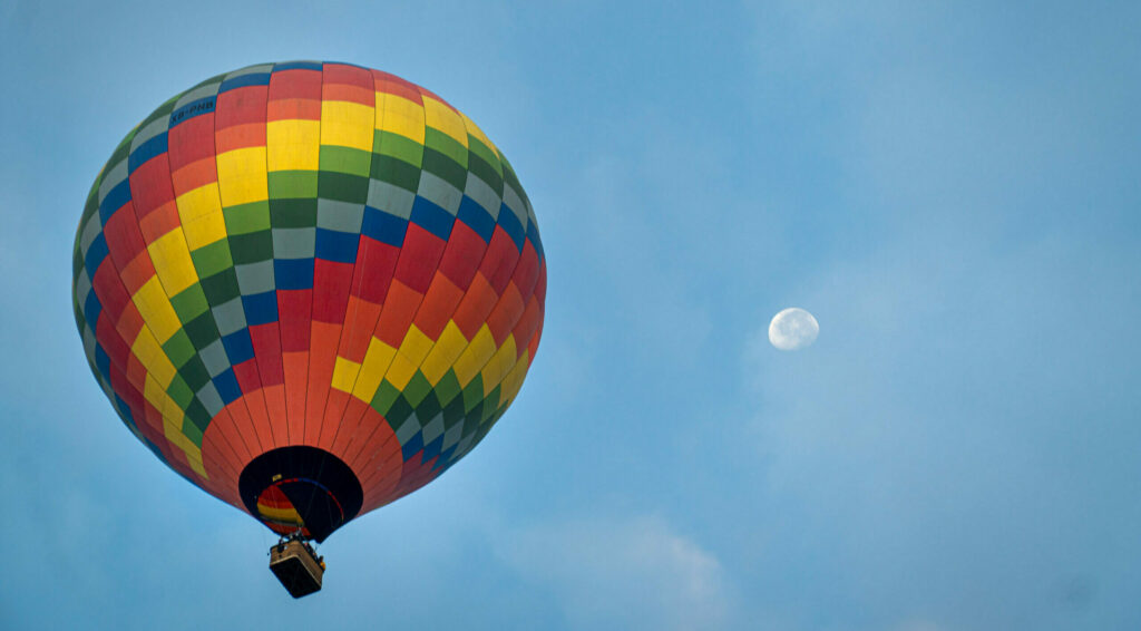 hot air balloon floating to the moon