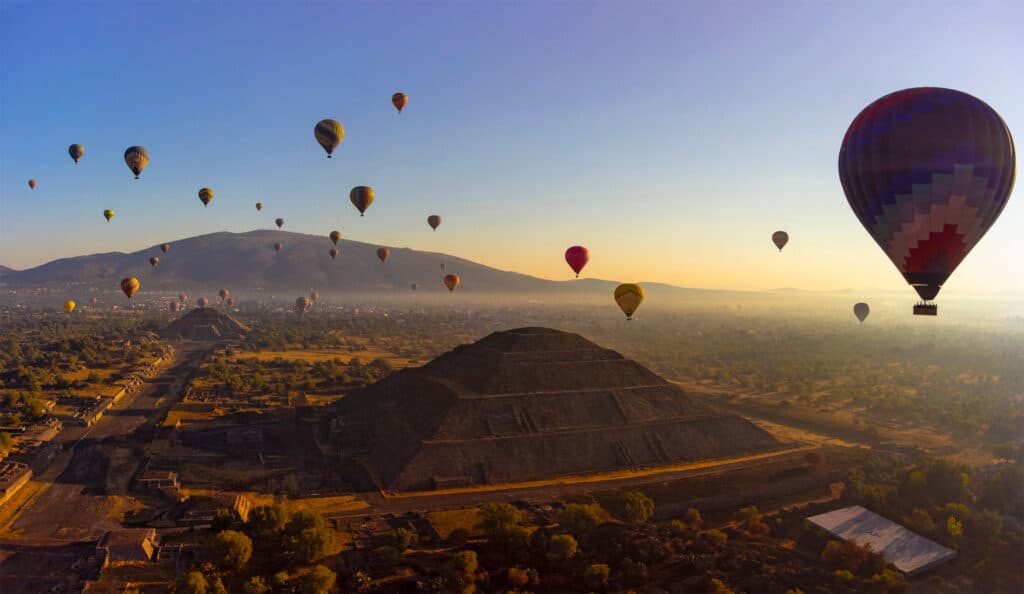 Sunrise on hot air balloon over the Teotihuacan pyramids