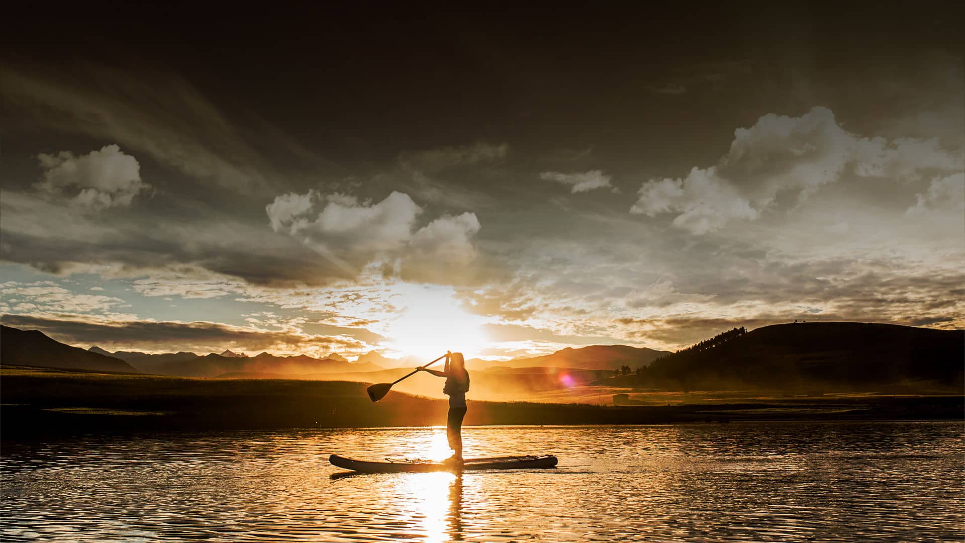 Sol y luna Pérou activite stand up paddle nature lac montagnes coucher soleil perou