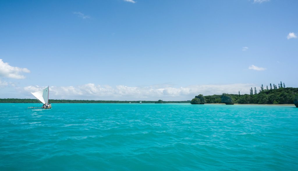 Traditional,Caledonian,Sailing,Boat,On,Turquoise,Water,In,Upi,Bay