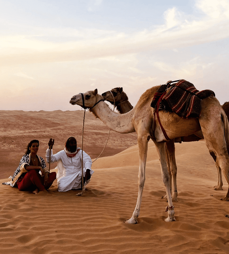 Camp privé désert Oman dromadaire
