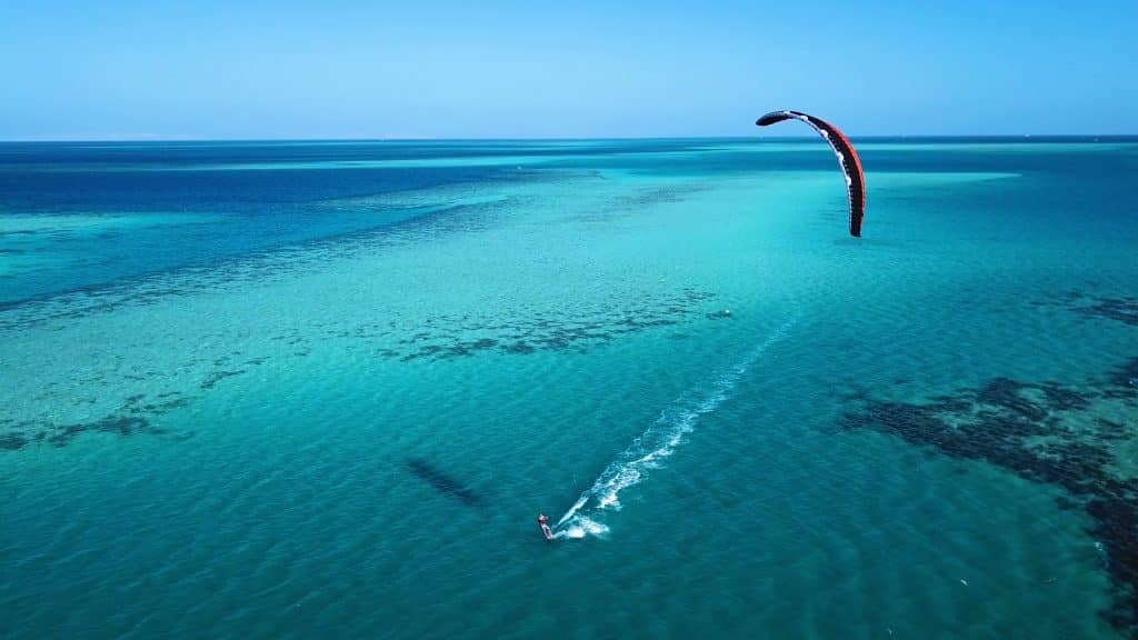 Aerial,View.,Kite,Surfing,On,The,Blue,Sea,In,The