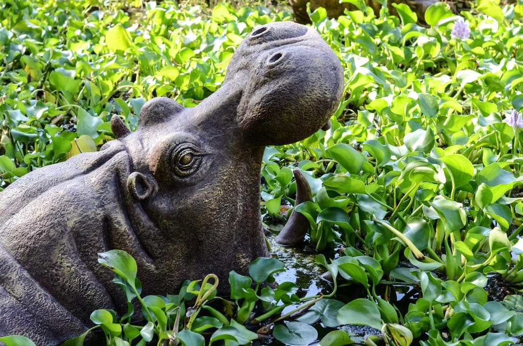 A,Sculpture,Of,A,Hippopotamus,Made,Of,Metal,Is,In