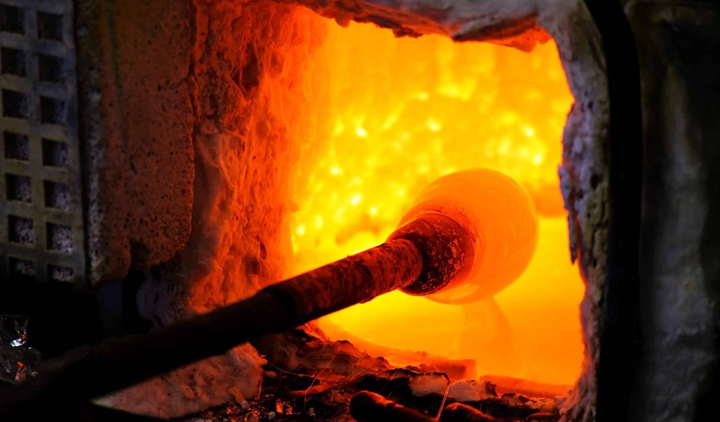 Manufacturing,Glass,In,A,Traditional,Oven,,The,Glassblower,Working,On