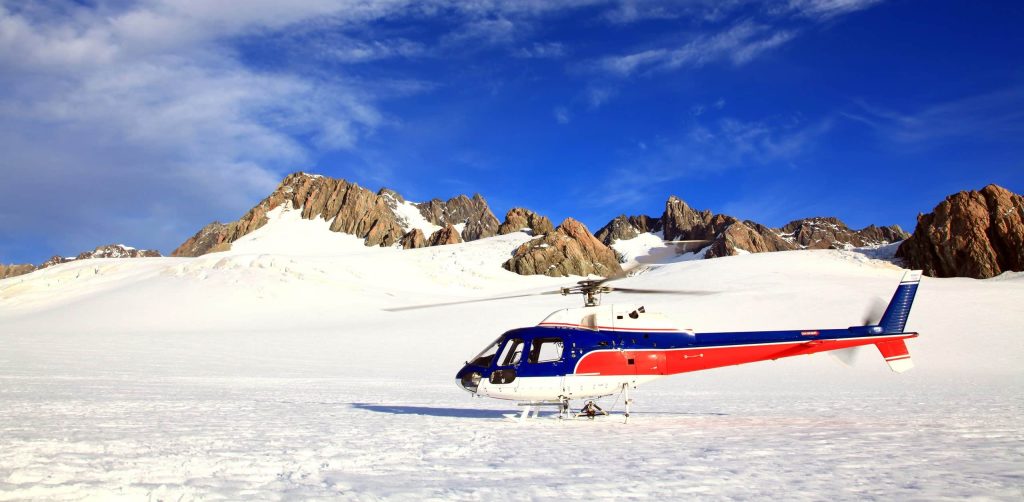 Helicopter,Landing,On,Top,Of,Franz,Josef,Glacier,Mount,Cook