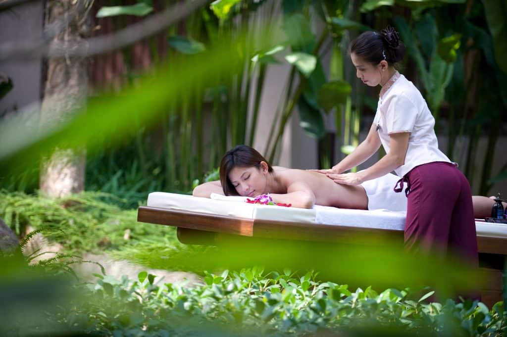 A,Young,Woman,Gets,A,Massage,Outside,In,A,Tropical