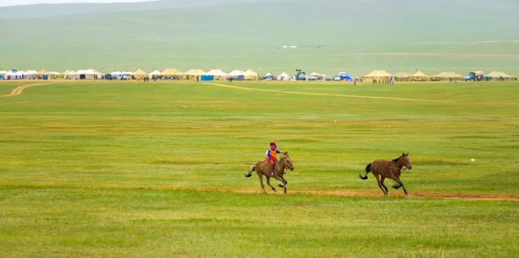 Ulaanbaatar,,Mongolia, ,June,,,:,Young,Boy,On,Horseback