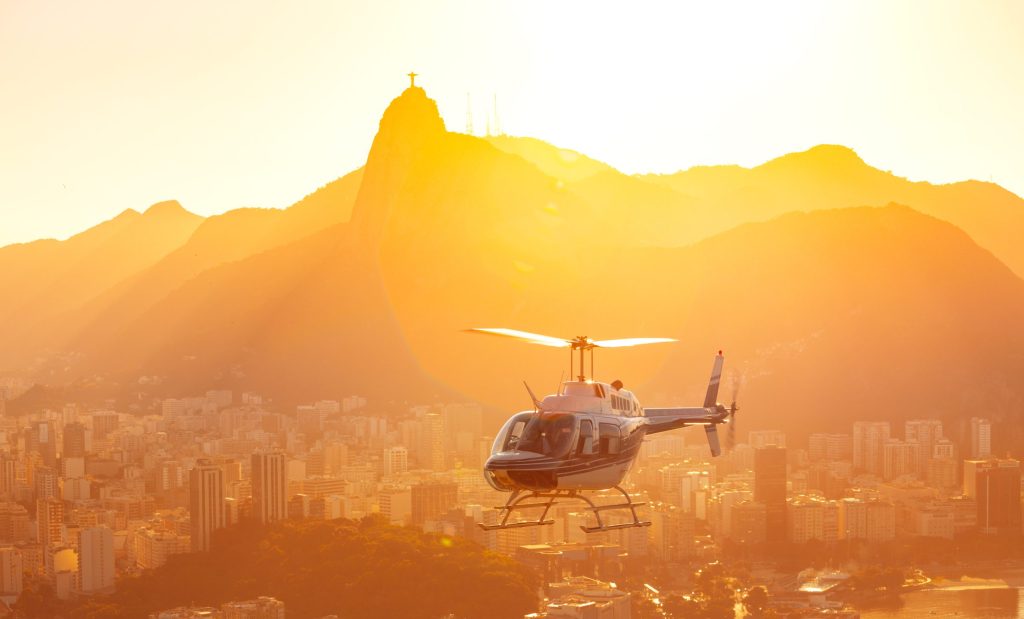Helicopter,Flying,Over,Rio,De,Janeiro,At,The,Evening,Light.