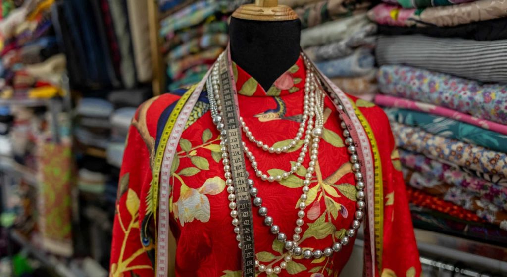 A,Woman,Silk,Dress,Inside,A,Tailor,Shop,In,Ho