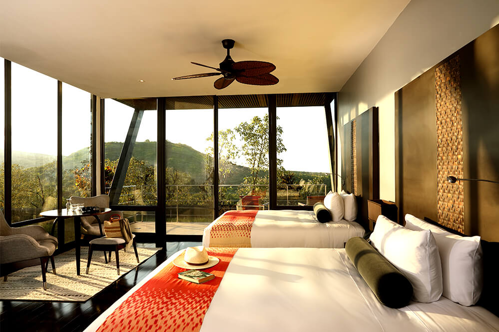 Equateur Galapagos Pikaia Lodge chambre lits jumeaux vue montagne